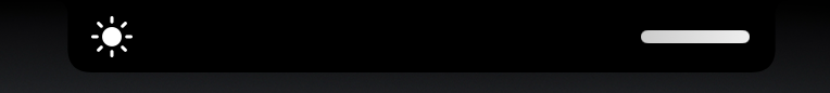 The notch showing a brightness indicator: a sun icon on the left and a white level bar on the right